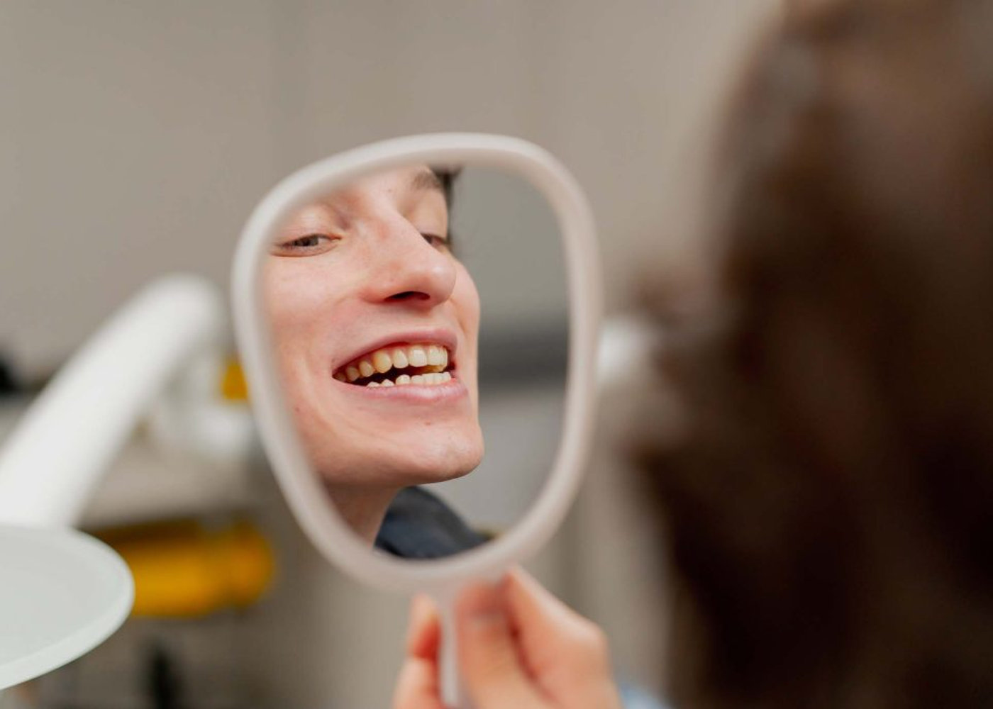 Patient receiving a tooth-colored filling